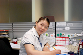 Mary at her desk